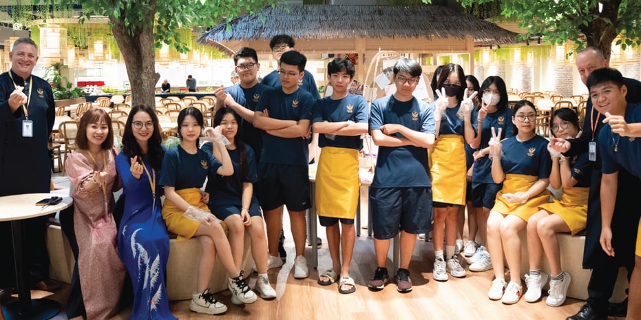 Victoria's students and Tropical Restaurant team